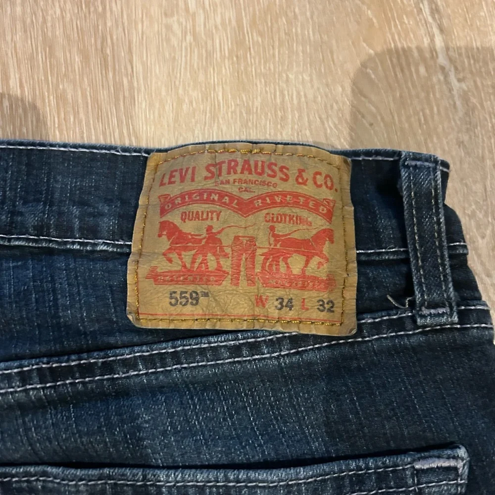 Levi's 559 Bootcut Men's Jeans - Dark Wash Blue